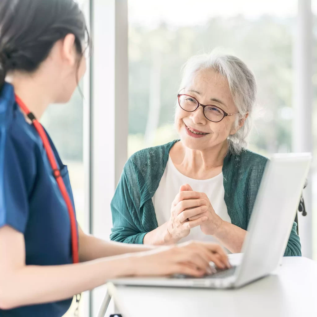 Nurse talking to Old Lady