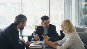 Leaders meeting around a table