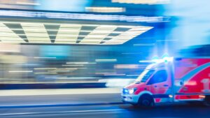 Ambulance in motion at night