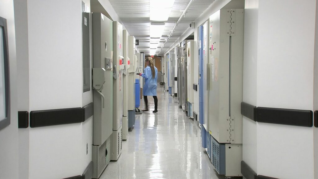 Professional walking down a hospital hallway