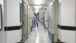 Professional walking down a hospital hallway
