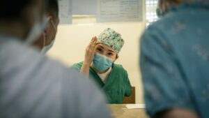Caregiver supporting a patient