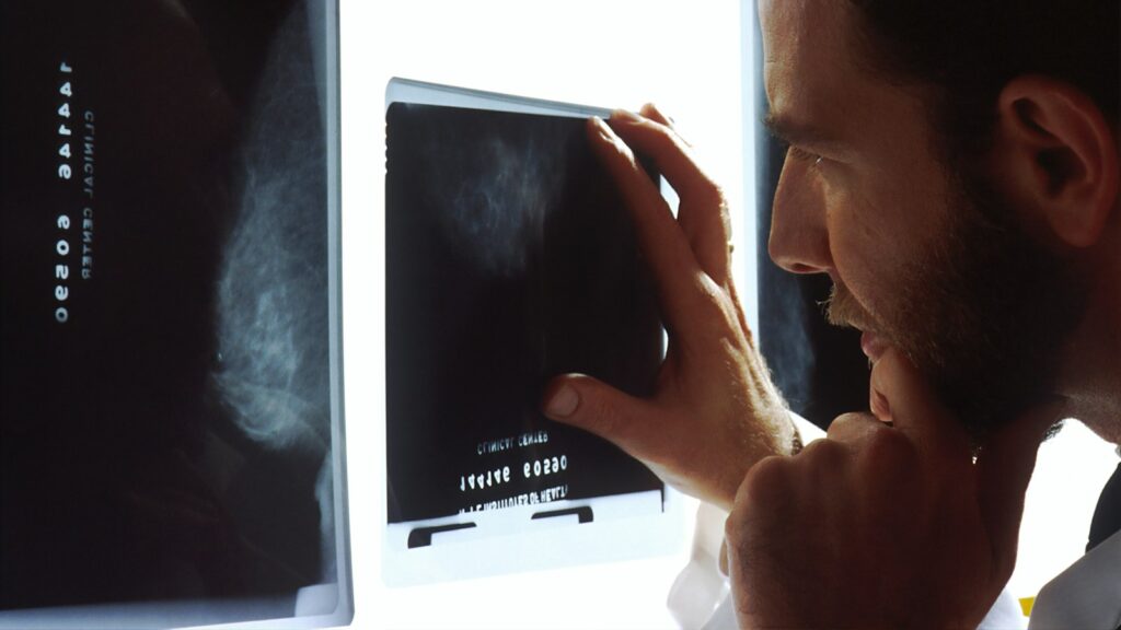 Clinician holding a tablet