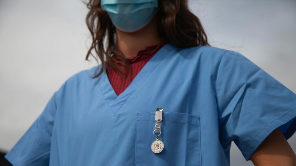 Healthcare worker wearing protective goggles